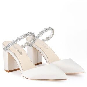 Chic White Heels with Silver Accents